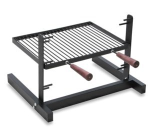 Adjustable fireplace grill