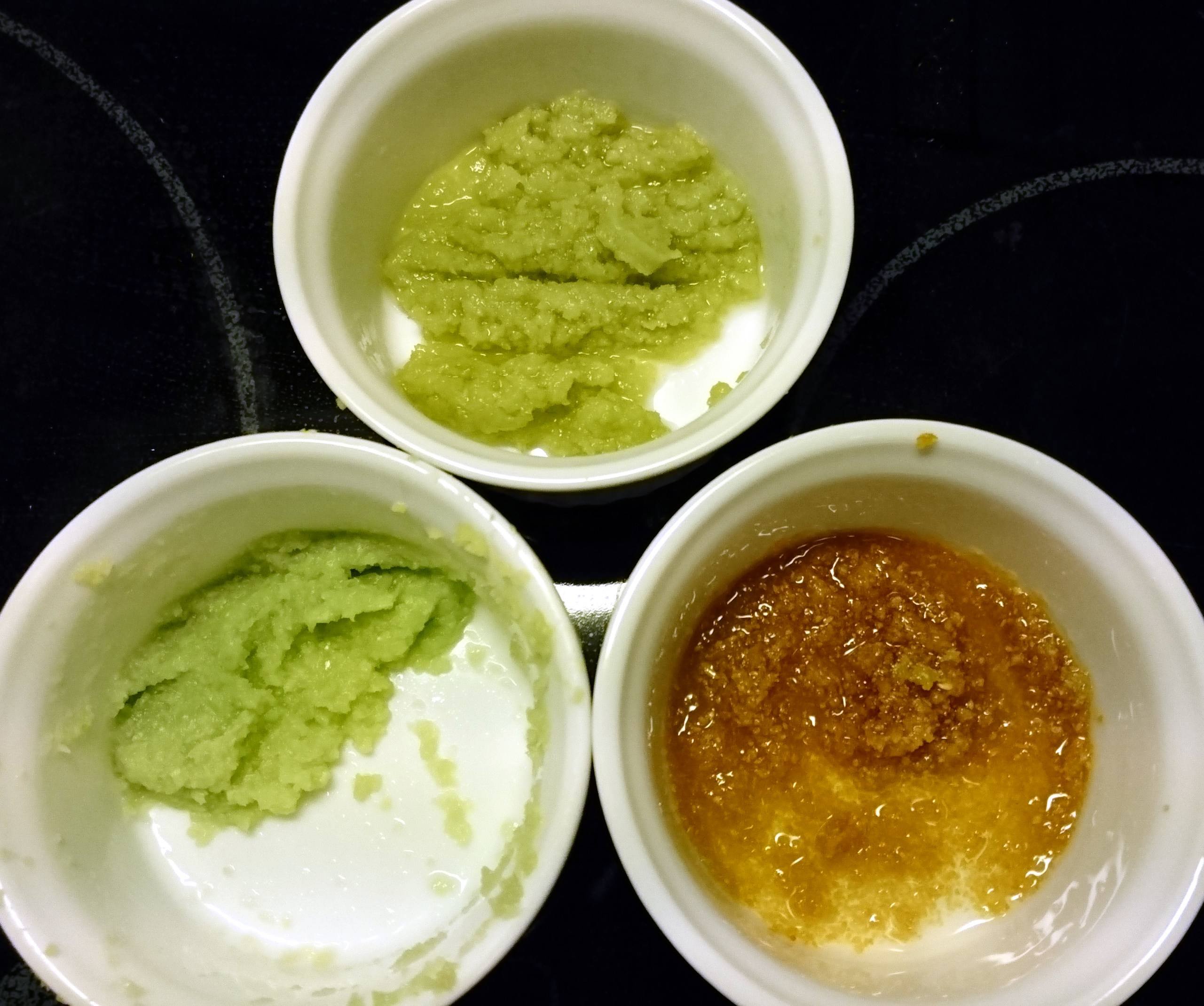 Ginger garlic paste. Clockwise starting lower right: Raw, lightly cooked, browned.